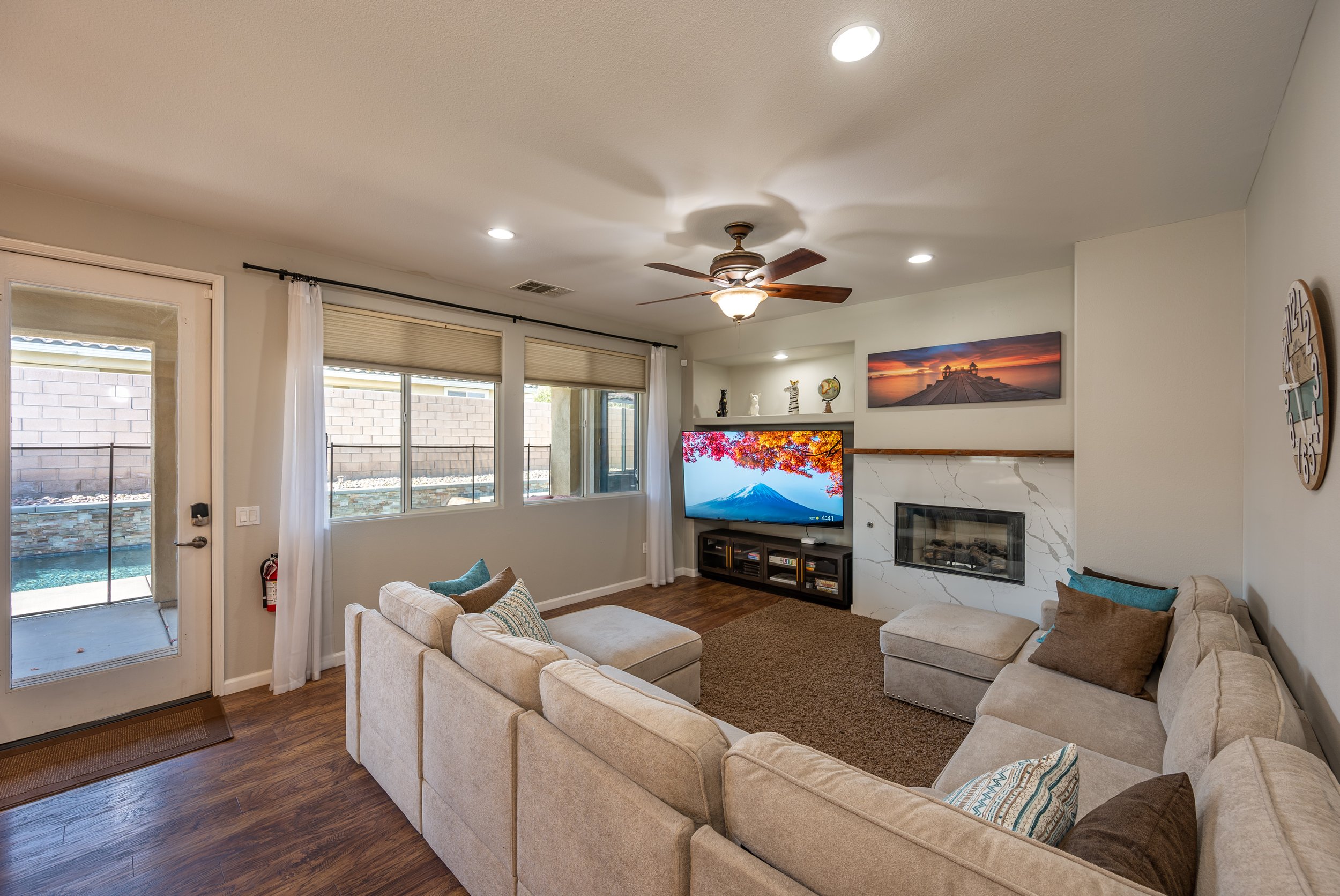 Living room with large TV and sectional sofa